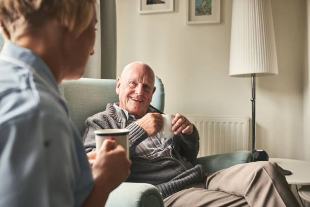male patient talking to carer